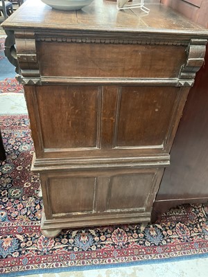 Lot 1262 - 17th century oak geometric chest with an arrangement of four long drawers, each with brass drop handles, on turned bun feet