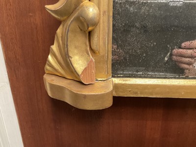 Lot 1267 - Victorian gilt framed wall mirror of arched form with foliate leaf cresting, 110cm wide x 74cm high