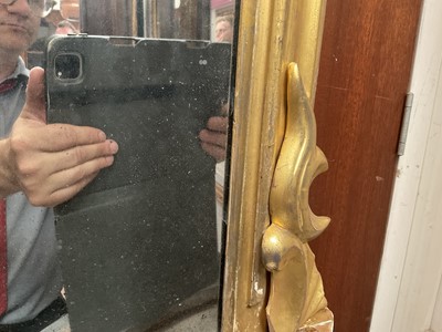 Lot 1267 - Victorian gilt framed wall mirror of arched form with foliate leaf cresting, 110cm wide x 74cm high