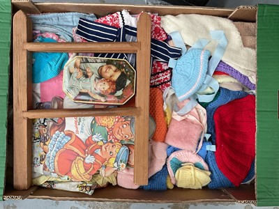 Lot 50 - Two boxes of dolls and doll's clothes, and two boxes of teddy bears (4 boxes)