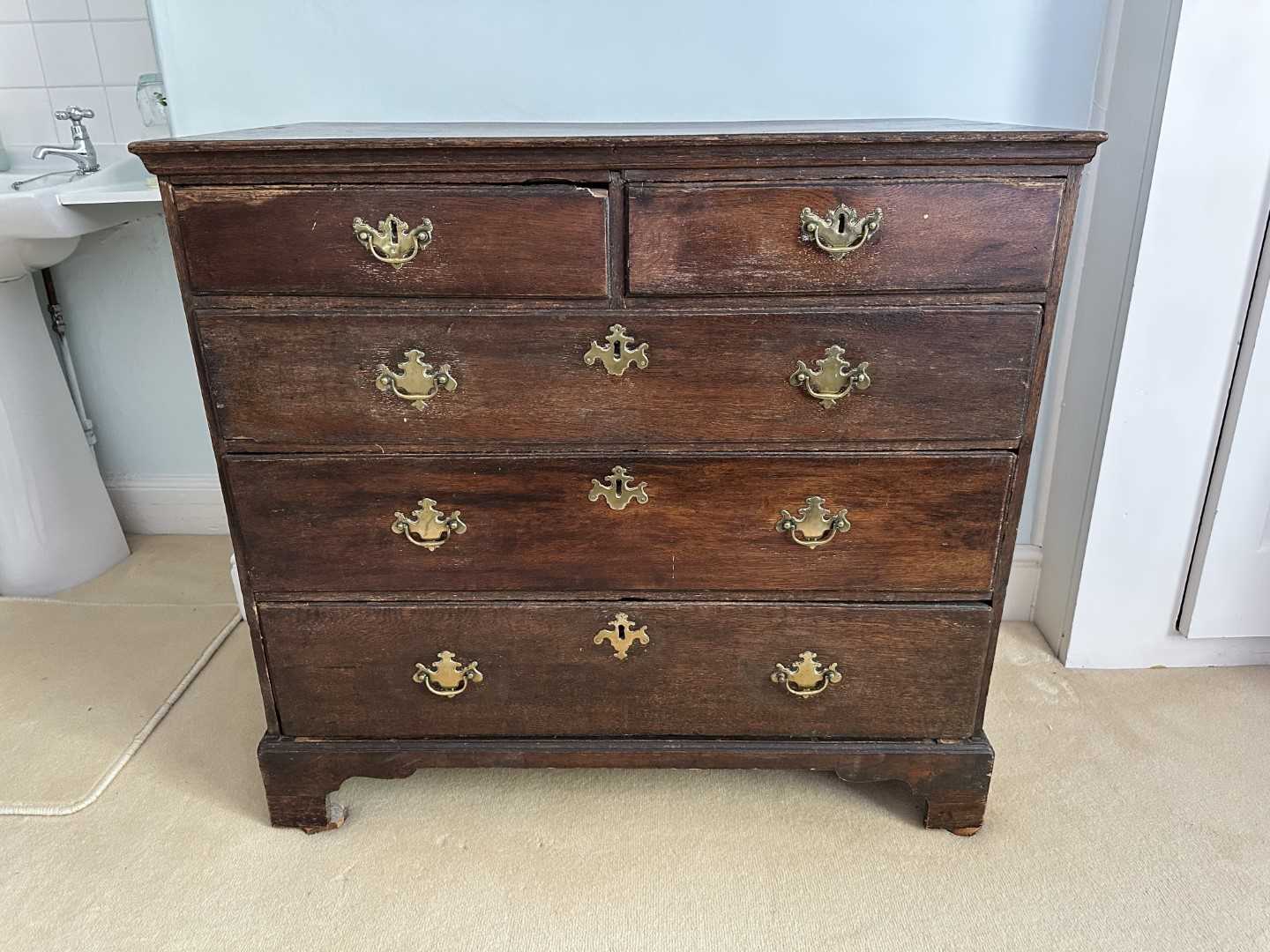 Lot 1272 - 18th century oak chest of two short and three long drawers with brass handles, on bracket feet, 94.5cm wide x 50.5cm deep x 86.5cm high