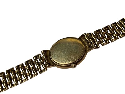 Lot 61 - Record De Luxe 9ct gold ladies' wristwatch on an integral 9ct gold bracelet