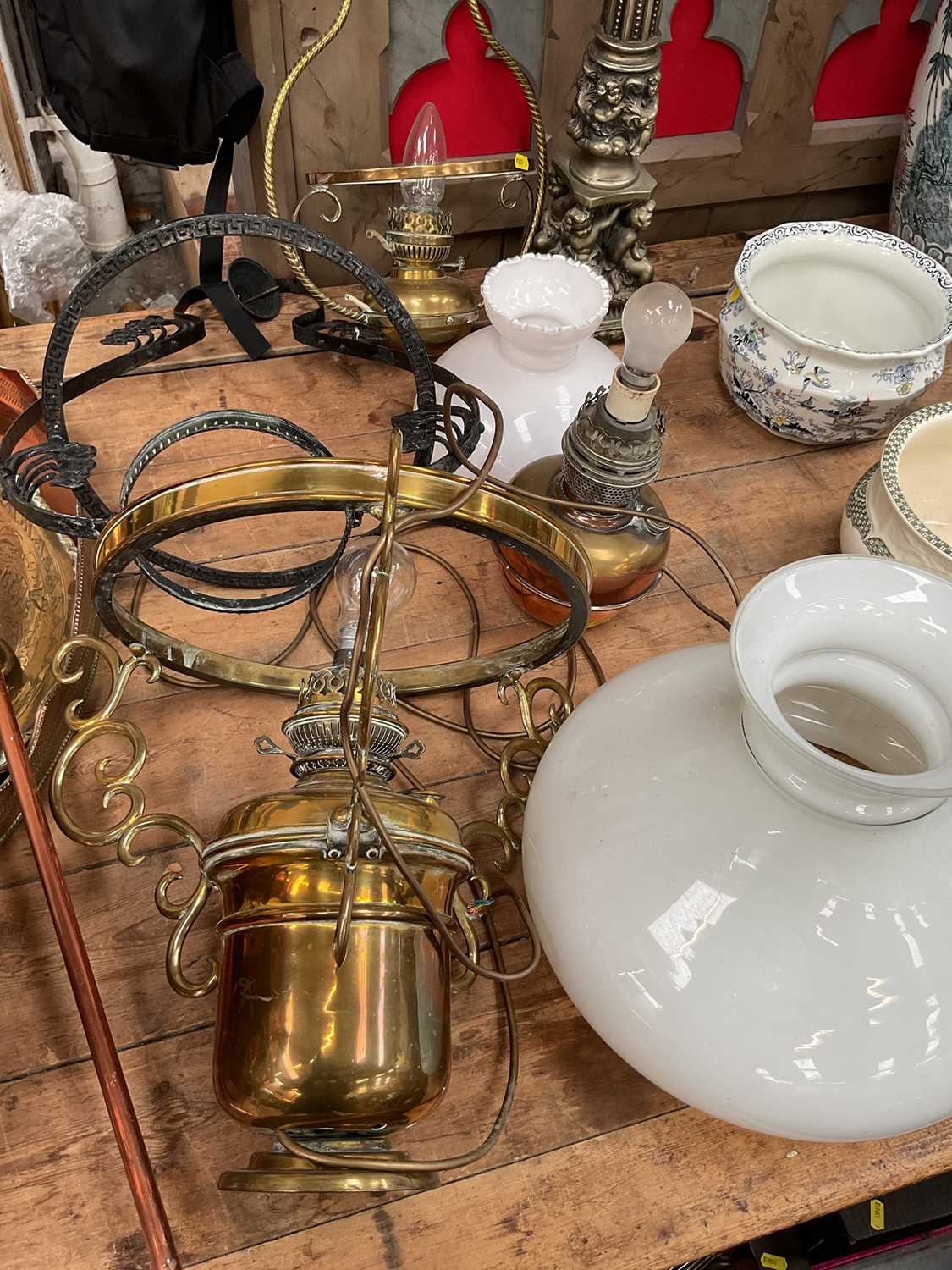 Lot 31 - Group of lighting, including a modern lamp and three brass and metal hanging lanterns