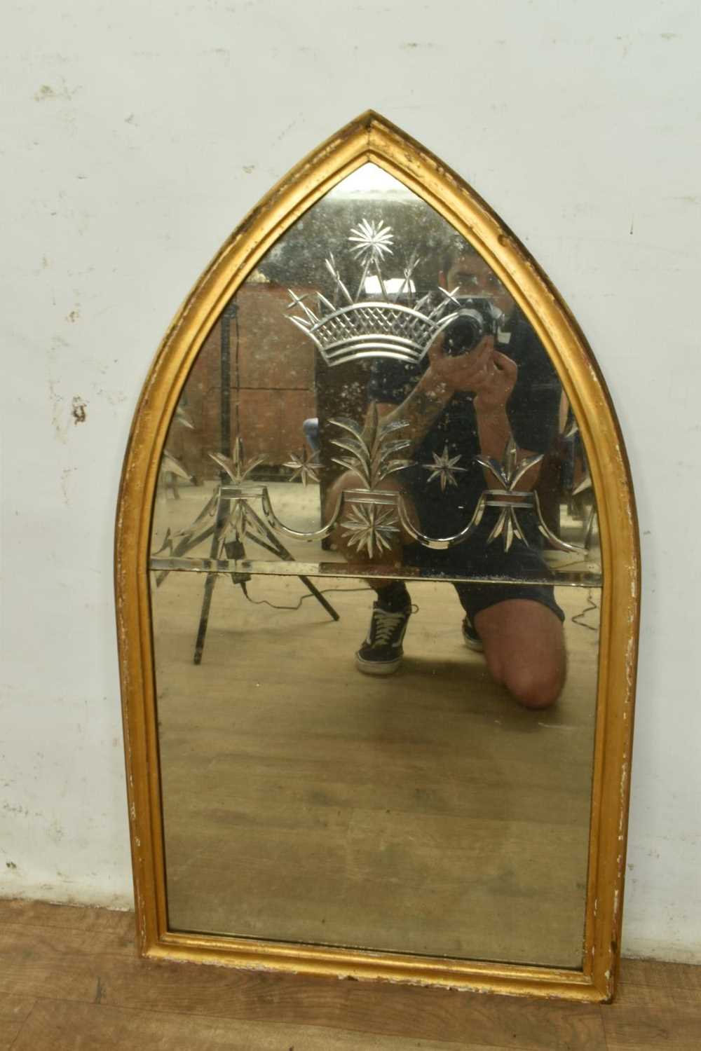 Lot 1285 - Early 19th century gothic gilt arched and engraved mirror