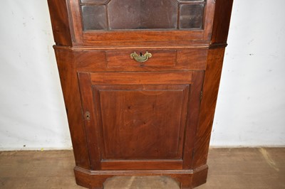 Lot 1288 - George III mahogany two height standing corner cupboard