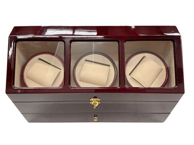 Lot 1142 - Triple watch winder with glazed lid and single draw below, as new and in working order