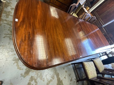 Lot 1337 - Very large mahogany extending dining table, the rounded rectangular top on massive fluted legs and castors, to include four additional leaves, 136cm wide with 158cm long, extending to approximat...