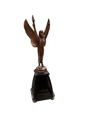 Lot 492 - Vintage bronzed metal trophy in the form of victory, raised on an ebonised base, 21cm in overall height.