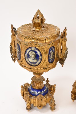 Lot 808 - 19th century French ormolu three piece clock set with inset enamelled panels depicting military figures