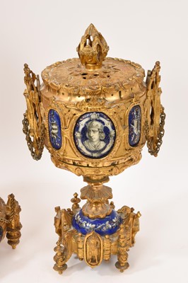 Lot 808 - 19th century French ormolu three piece clock set with inset enamelled panels depicting military figures