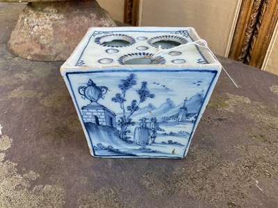 Lot 8 - 18th / 19th century blue and white delftware flower vase, of square tapering form, painted with figures in a landscape, 9.25cm high