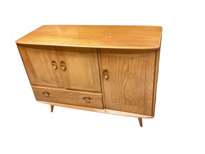 Lot 1401 - Ercol sideboard with three cupboards and single drawer, 114cm wide, 48cm deep, 80cm high