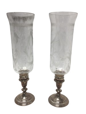 Lot 304 - Pair contemporary silver candlesticks, with inverted bell shaped stems, on circular weighted bases