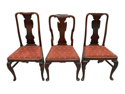 Lot 1264 - Pair of early 18th century carved walnut side chairs, and another similar