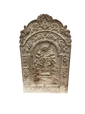 Lot 5292 - 18th century cast iron fire back of small size, arched and moulded with flowers, approximately 54 x 37cm