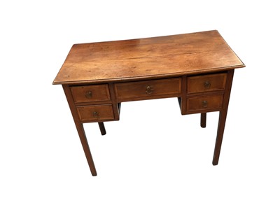 Lot 1261 - George III fruitwood and crossbanded lowboy, with five drawers to the kneehole on square internally chamfered legs, 86cm wide x 46cm deep x 73cm high