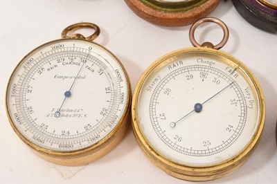 Lot 713 - Nine antique pocket barometers, various makers, including Victorian examples, some in leather cases