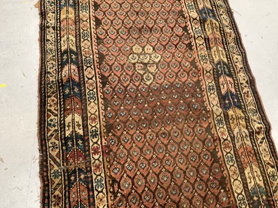 Lot 1497 - Antique Persian runner, with boteh ground in geometric borders, 280 x 110cm
