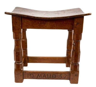 Lot 1200 - Rare early Robert 'Mouseman' Thompson oak stool, with bowed burr wood top and signature mouse to the facetted legs, carved to stretcher and dated 'MAUD 1936'