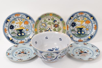 Lot 6 - 18th century tin glazed pottery bowl with polychrome flowers, and five similar plates (4)