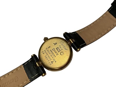 Lot 90 - Must De Cartier ladies' silver gilt wristwatch