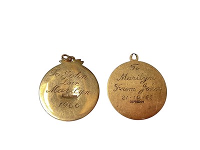 Lot 69 - Two 9ct gold St. Christopher pendants