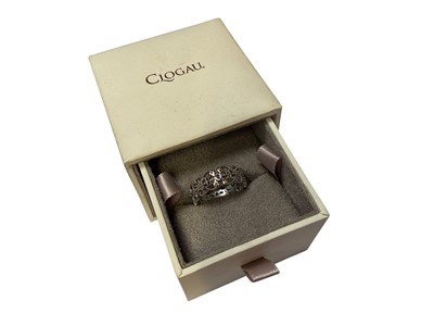 Lot 78 - Clogau Welsh silver ring with keyhole, hearts and foliate scroll decoration, size S½, in original box