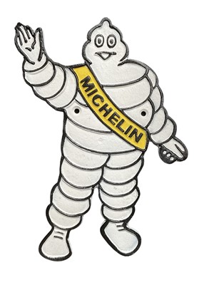 Lot 12 - Modern metal garage wall plaque of Mr Bibendum (The Michelin man), 34cm in overall height.