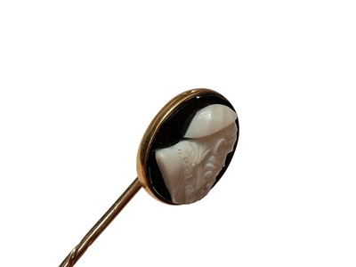 Lot 25 - Edwardian 15ct gold blue stone and seed pearl bar brooch, yellow metal bar brooch set with three cultured pearls, freshwater pearl stick pin and a cameo stick pin (4)