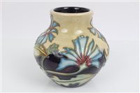 Lot 2116 - Moorcroft Pottery vase decorated with flowers...