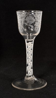 Lot 35 - 18th century engraved glass with opaque twist stem