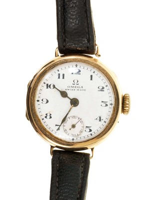 Lot 507 - 1920s ladies Omega 14ct gold wristwatch on leather strap