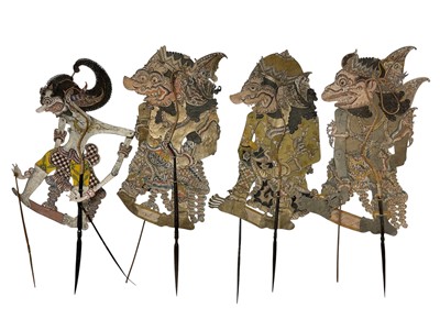 Lot 724 - Six Indonesian Wayang Kulit shadow puppets, including wooden and leather examples, some with horn handles