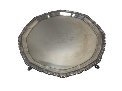 Lot 286 - George V silver salver with piecrust edge and presentation inscription, raised on three pad feet, (Chester 1920), maker Barker Bros. 21cm, 13oz.