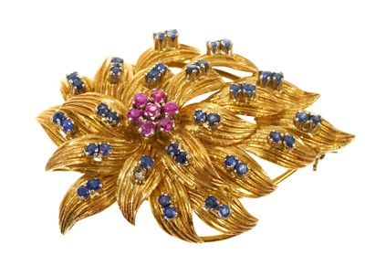 Lot 458 - 1960s ruby and blue sapphire floral spray brooch