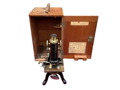 Lot 2506 - Service microscope by W. Watson & Sons in case, together with a set of scientific scales in glazed mahogany case (2)