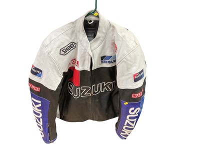 Lot 32 - Vintage Cromwell motorcycle helmet together with a Suzuki branded Shoei leather motorcycle jacket, (2).