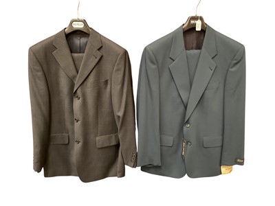 Lot 2152 - Gentlemen's wool suits, navy Baumler suit new with tags size 50, grey check suit size 50 and grey pin stripe suit size 50 both by Baumler. Plus a navy stripe suit size 50 by Canali.