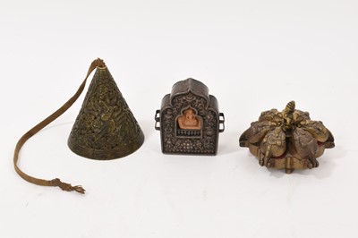 Lot 738 - Tibetan portable copper and white metal shrine, a Tibetan candle snuffer and an Indian brass Kumkum tikka box