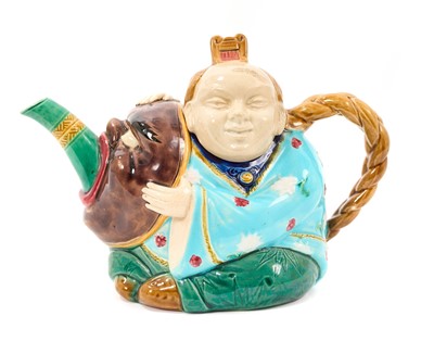 Lot 43 - Minton majolica teapot and cover, in the form of a seated Chinaman, circa 1880