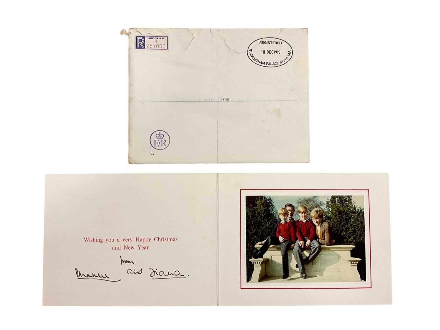 Lot 33 - T.R.H. The Prince and Princess of Wales, signed 1990 Christmas card with twin gilt Royal cyphers to cover, colour photograph of the relaxed Royal couple with the young Princes resting on a marbl...
