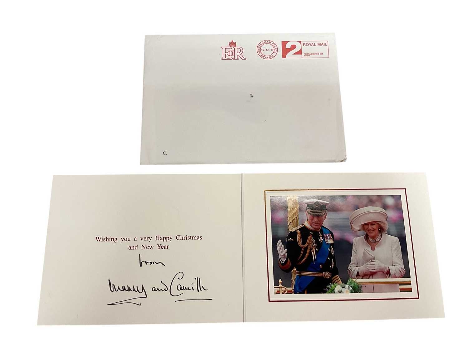 Lot 55 - H.R.H. Prince Charles Prince of Wales (now H.M. King Charles III) and H.R.H. Camilla Duchess of Cornwall (now H.M. Queen Camilla) signed 2012 Christmas card with gilt Royal cyphers to cover, colou...