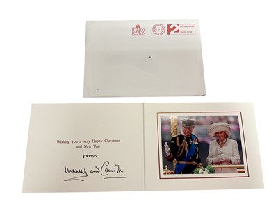 Lot 55 - H.R.H. Prince Charles Prince of Wales (now H.M. King Charles III) and H.R.H. Camilla Duchess of Cornwall (now H.M. Queen Camilla) signed 2012 Christmas card with gilt Royal cyphers to cover, colou...
