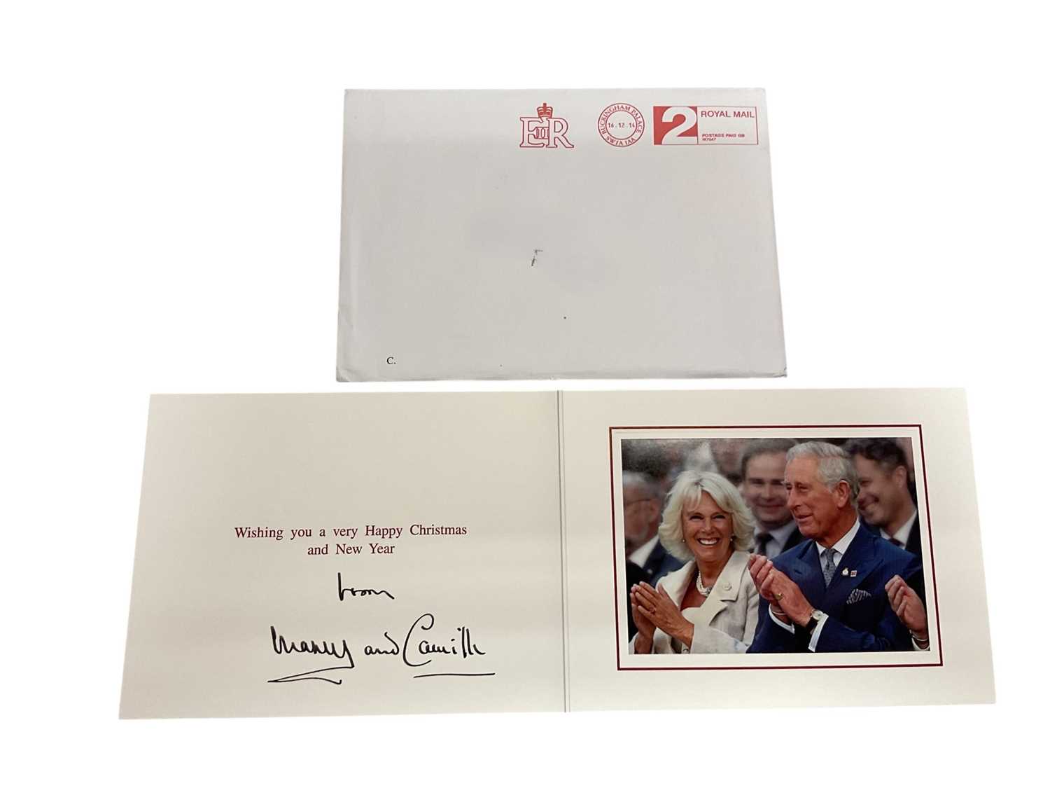 Lot 57 - H.R.H. Prince Charles Prince of Wales (now H.M. King Charles III) and H.R.H. Camilla Duchess of Cornwall (now H.M. Queen Camilla) signed 2014 Christmas card with gilt Royal cyphers to cover, colou...