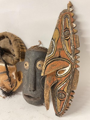 Lot 760 - Six tribal masks, including Sepik river masks, Zaire, one claimed to be Congo mask from a Pygmy tribe, polychrome Bapende mask and one other unidentified. (6)
