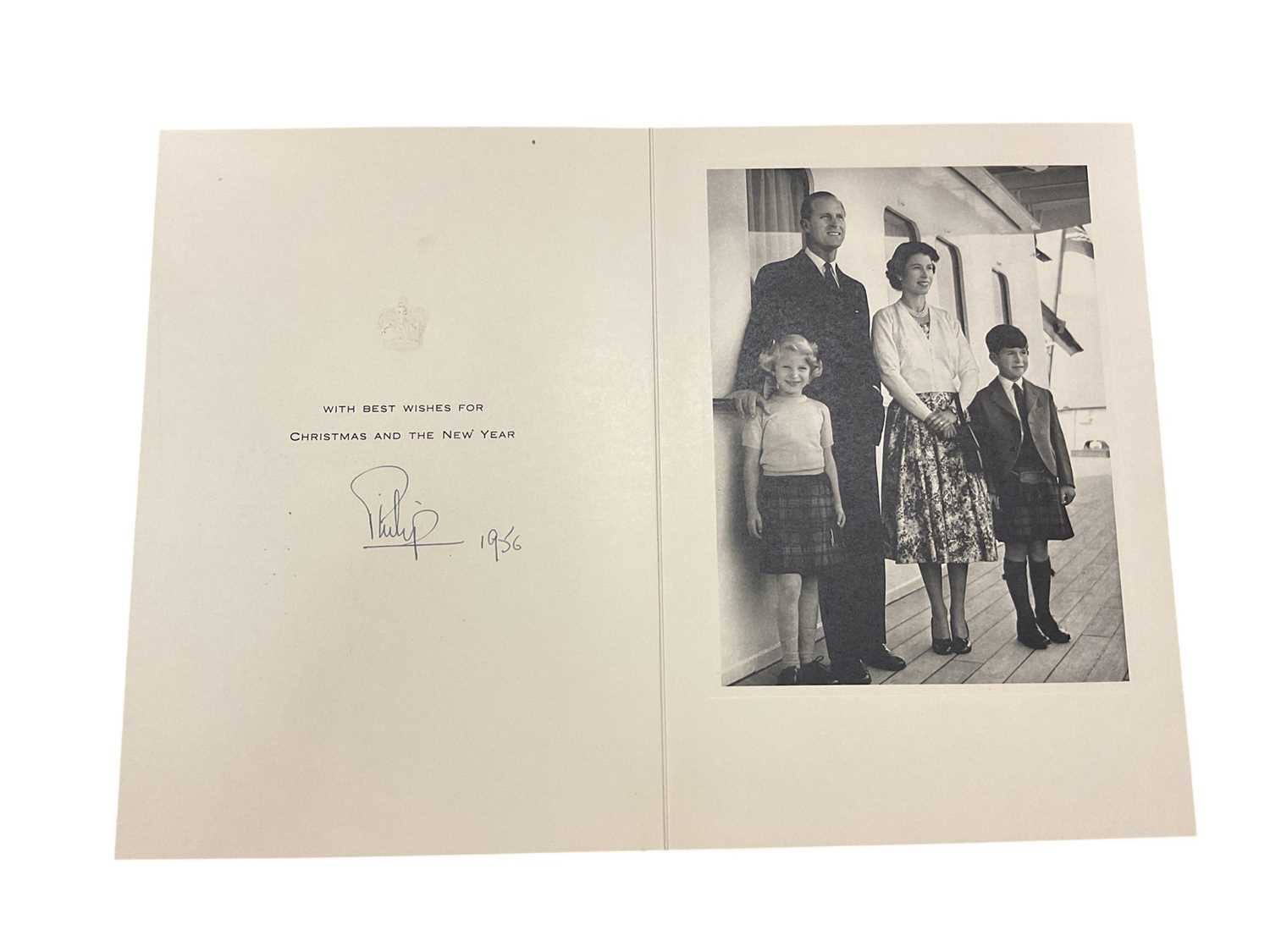 Lot 70 - H.R.H. The Duke of Edinburgh, scarce 1956 Christmas card with photograph of the young Royal Family on board the new Royal Yacht to the interior, signed in ink 'Philip 1956'