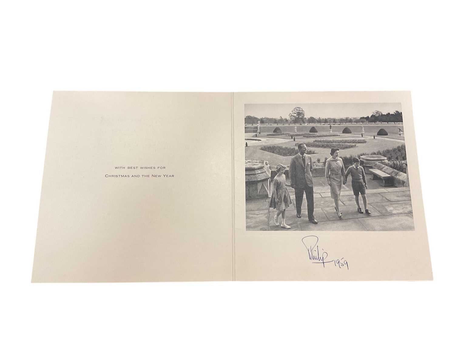 Lot 71 - H.R.H. The Duke of Edinburgh, scarce 1959 Christmas card with photograph of the young Royal Family on a garden terrace to the interior, signed in ink 'Philip 1959'