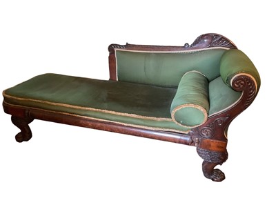 Lot 1274 - Good early 19th century mahogany chaise longue, green upholstered with carved showwood frame in the Egyptian revivalist taste, raised on heavily carved paw feet