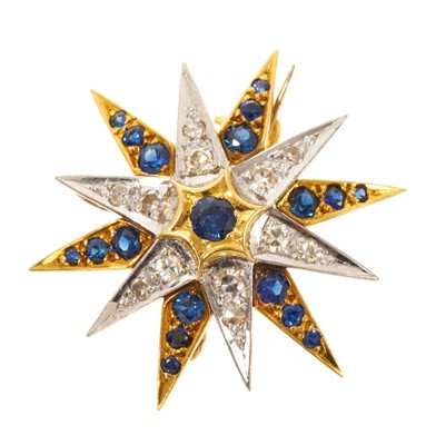 Lot 457 - Victorian style diamond and sapphire star pendant/brooch with mixed-cut blue sapphires and single cut diamonds, 29mm.