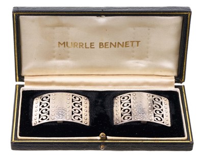 Lot 423 - Pair of Murrle Bennett silver (850 standard) buckles with pierced scrolls, riveted and hammered finish, maker's marks, stamped 850, in gilt tooled black leather box. The buckles 31mm x...